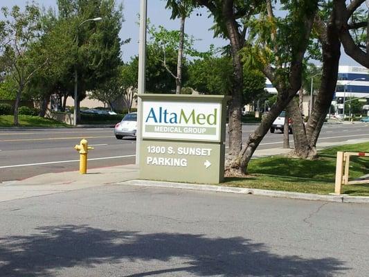 street signage of altamed when you turn into the building