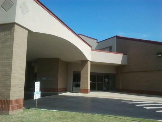 Drive thru covered area to drop off books and audio books.