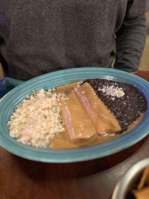 Chicken enchiladas with Chipotle Wine sauce.