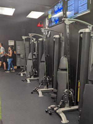 Gym has machines as well as hand weightsamd  kettle bells.