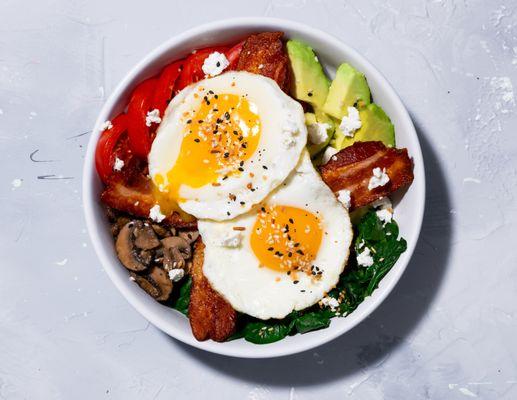 Keto Bowl: Sauteed spinach, mushrooms, avocado, tomato, bacon, two eggs your way, topped with everything bagel seasoning.