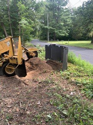 Grinding next to busy road with protective shields