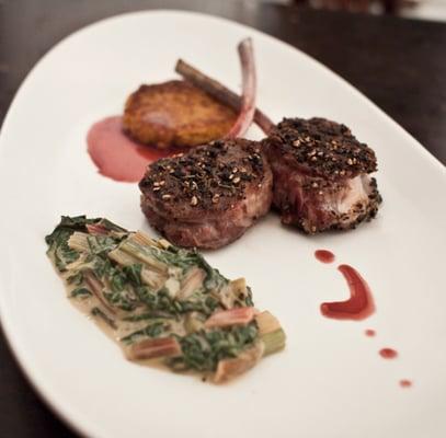 Herbed Lamb Chops with Sweet Potato Cake, Creamed Swiss Chard and Red Wine Reduction