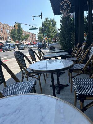 Outdoor seating with comfy chairs and cute Euro music!