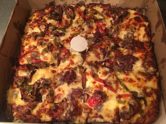 Philly steak pizza with sweet peppers