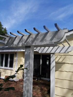 A backyard arbor that was cut and designed from the ground up.