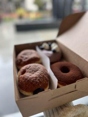 You can fit 4 donuts in a box.