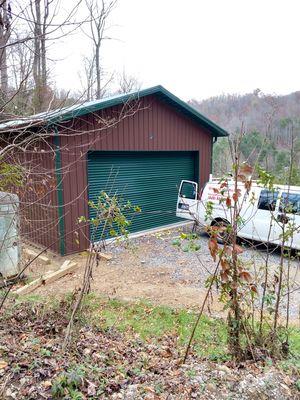 After install 16x16 insulated sheet roll up garage door in Jackson County NC