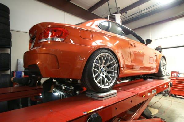 Corner balance and alignment on a BMW 1M.