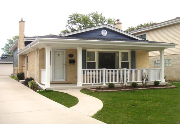 Tilden redid the roof on this house after we added a front porch to it.