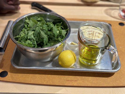 Ingredients for arugula salad w/ lemon Parmesan dressing