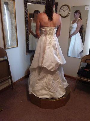 And a bustle on back of dress so it's  easier to walk and dance at reception