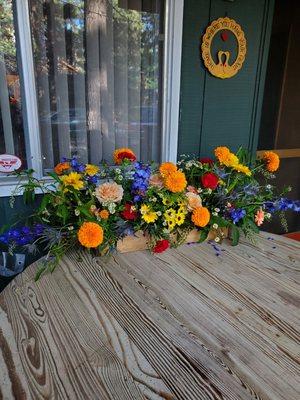 Fresh, bright, and beautifully constructed buffet table centerpiece for our celebration. Thank you, Liz.