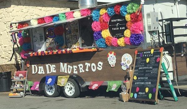 Southern Taco Bar decorated for Día de los Muertos. Even made an ofrenda.