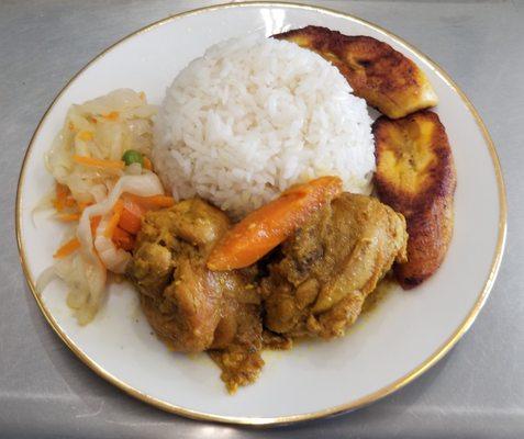 Curry chicken white rice cabbage or plantain