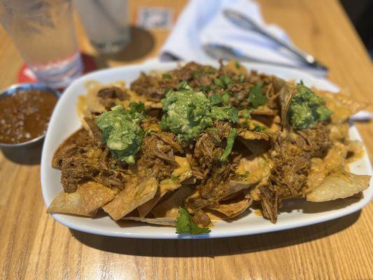 CHICKEN NACHOS with vegan queso