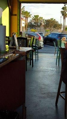 Covered outdoor bar.