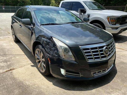 Cadillac before repairs.