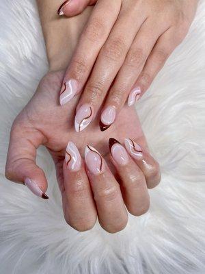 Swirl nails design with almond nails shape