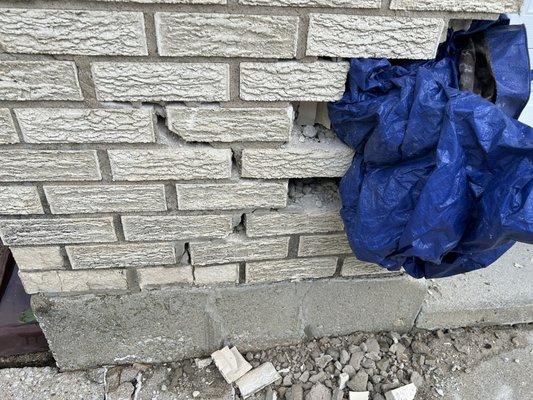 A tarp was placed in the wall allegedly to prevent water from entering.