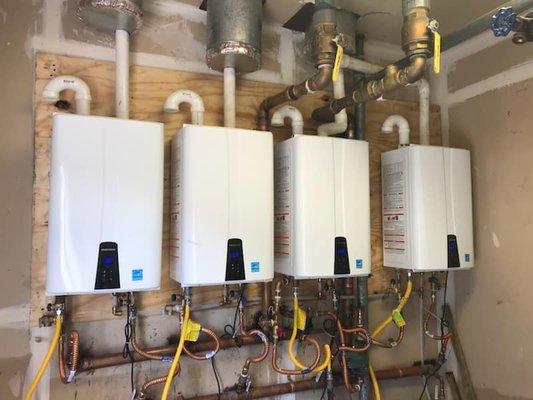 Tankless water heater installation for a hotel