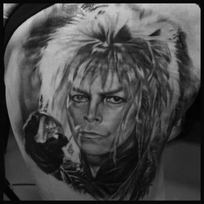 David Bowie black and grey portrait tattoo done by Char @tattoosbychar