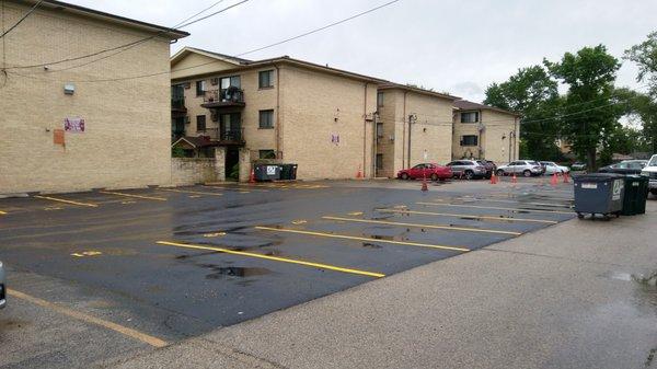 Asphalt Protected From The Elements By Sealing With Asphalt Coal Tar Sealer