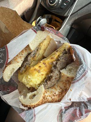 Sausage, egg, and cheese sandwich on a garlic bagel