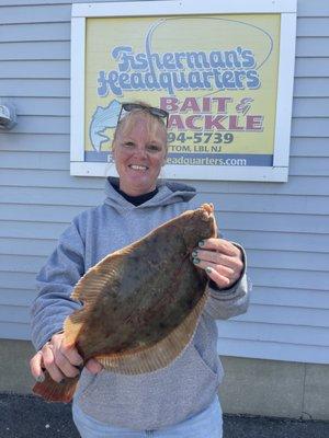 Brandy Hillegass enjoyed fishing worms for striped bass when she caught this big 2.35#  winter flounder.