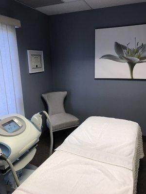 The treatment room for laser hair removal and photo rejuvenation.