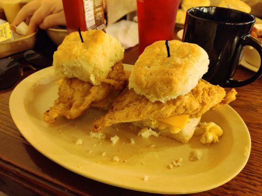 Chicken fried chicken biscuit sandwich with egg and cheese