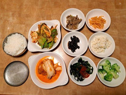 Banchan: rice, spicy romaine & cucumber, eggplant & onion, spicy radish salad, Korean black beans, macaroni salad, kimchi, seaweed, broccoli