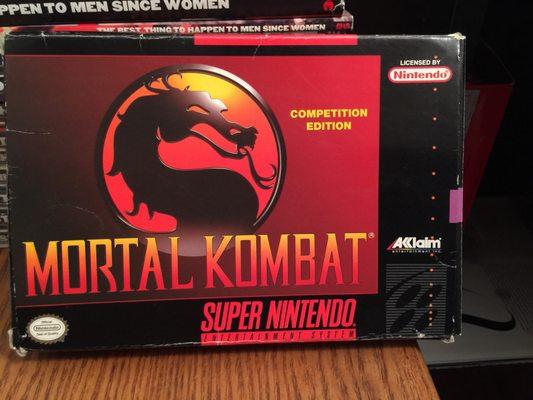 Mortal Kombat on SNES is ultra-censored but it came in its original packaging so I had to have it. Good times!