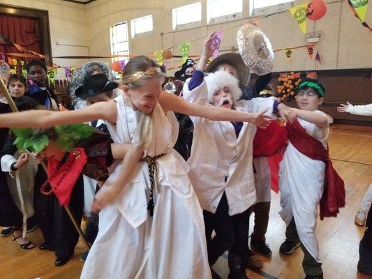 Great Alexandiran Hypatia holds back the spirits of the past at our Halloween carnival.