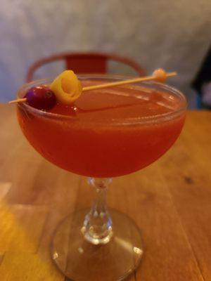 Not Carrie's Cosmo: Beefeater gin, lemon, cranberry syrup, Cointreau, & yellow Chartreuse.