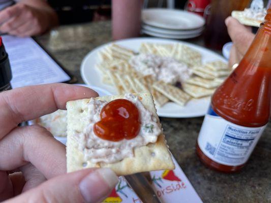 Smoked tuna dip with a little cocktail sauce and 2 drops of crystals or their sauce (how we were taught 10 years ago on our first visit)