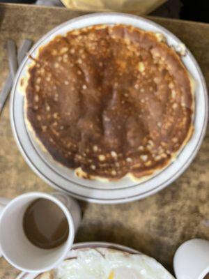 A pancake!  Yes that's the size of a dinner plate!