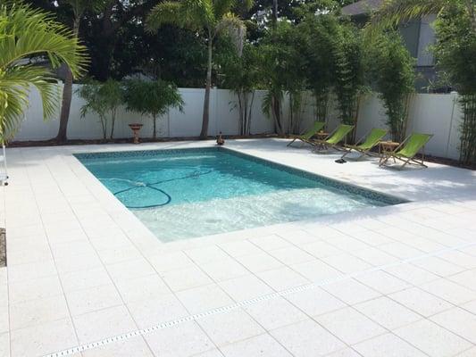 Artistic Shellock Ivory Pavers, Modern Pool and Sun Shelf