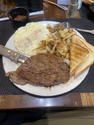 Steak, eggs, and potatoes