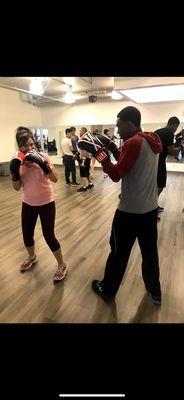 Pop up fundraiser class taught by coach Manny and Nomad boxing team