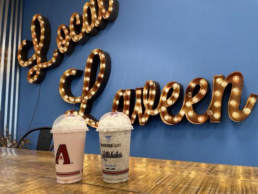 Cookies and cream shake and a strawberry shake