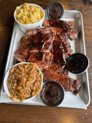 Full rack of ribs with spicy mac, and beans.