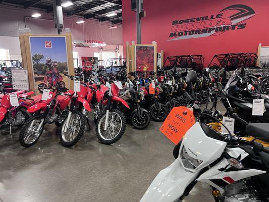 Dirt bikes on the showroom floor.