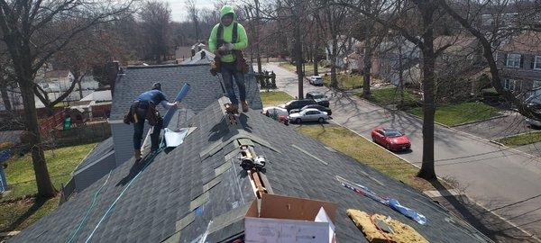 Installs new plywood and shingles