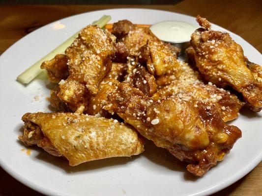 Crispy chicken wings. You can smell the spice.