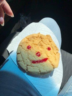 Smiley face cookie and fresh baked bread from the Panaderia next door