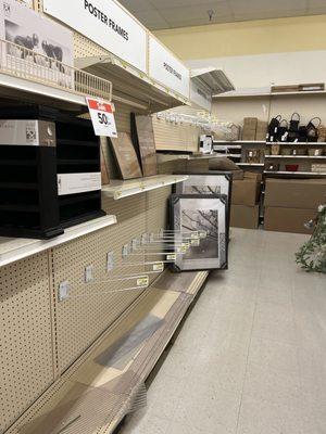 entirely empty shelves, nothing stocked.