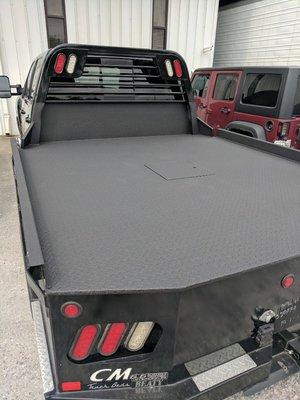 Bullet Brand spray on truck bed liner.