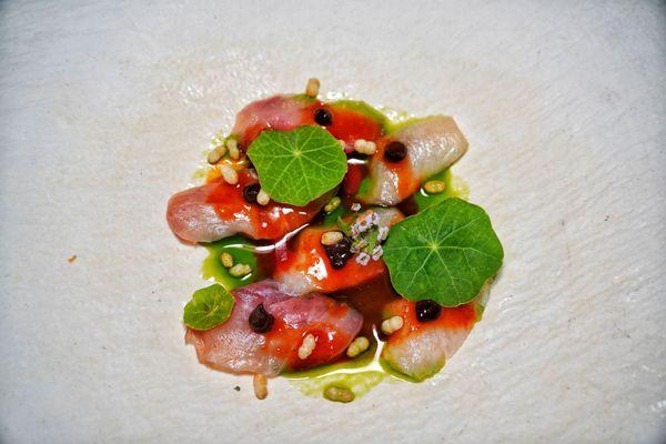 Hamachi crudo with black garlic, scallion oil and some puffed rice