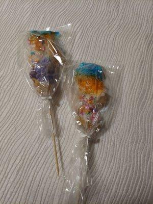 King Cake ON A STICK! About 6" long.